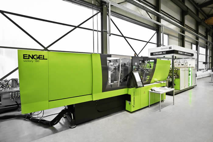 Injection moulding and the HP-RTM process: combined production unit in the Hennecke TECHCENTER